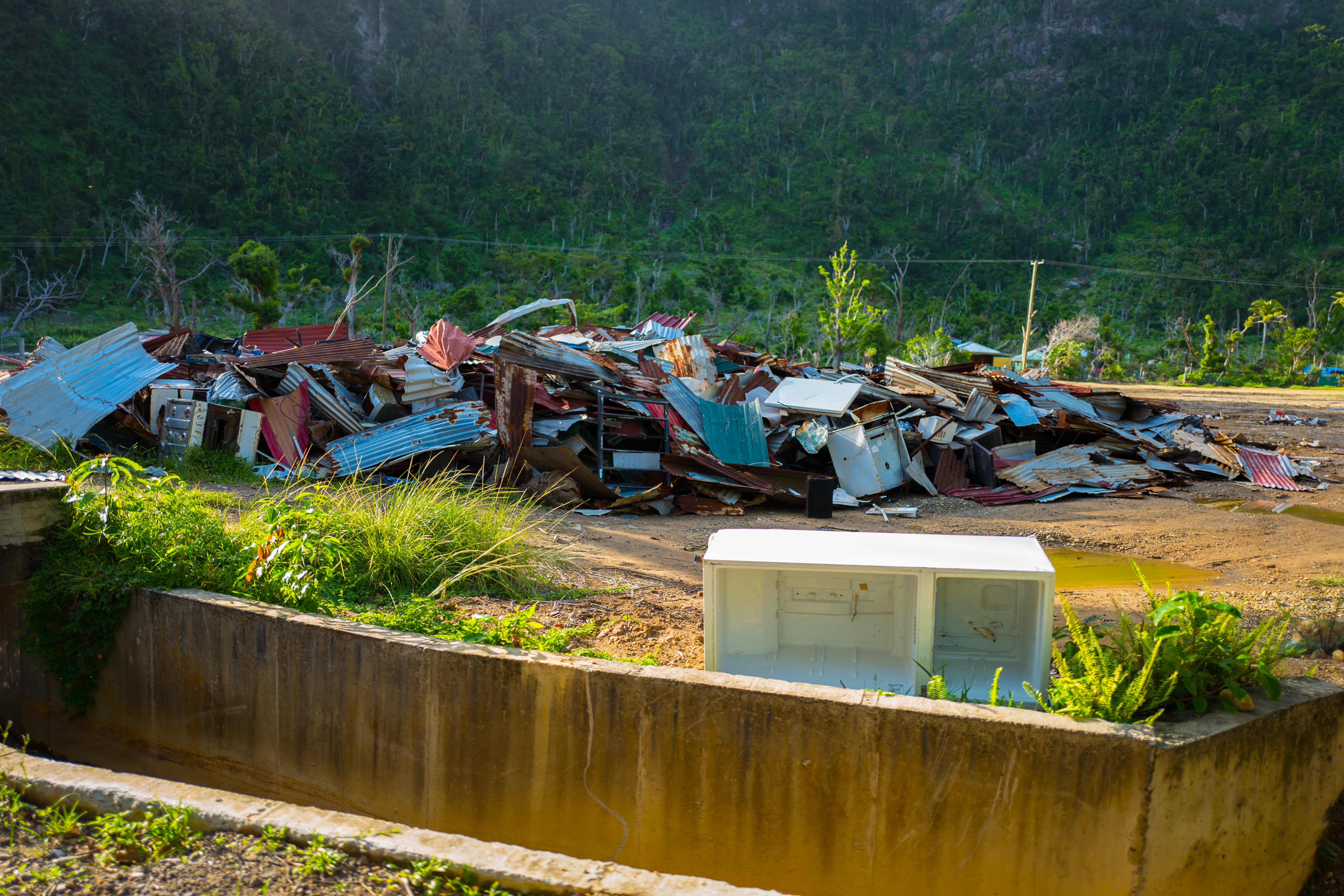 Roofing scraps and debris behind Soufriere's primary school.